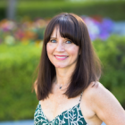 close up of Erin smiling on a sunny day